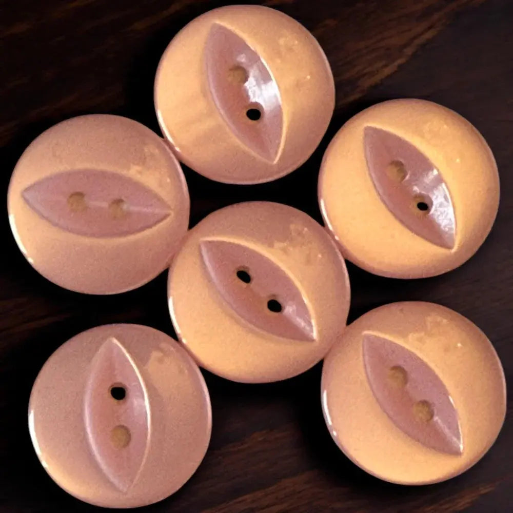 Collection of round, two-hole buttons.
