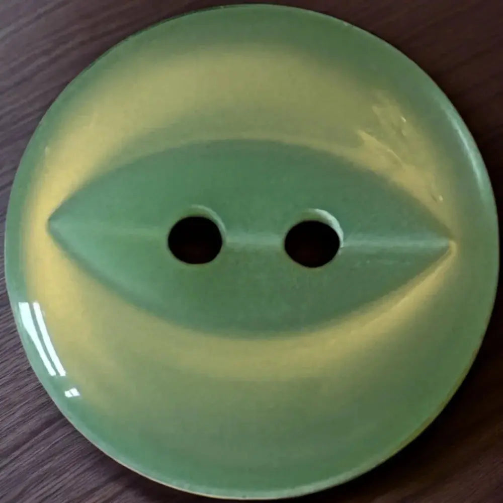 Green two-hole button.