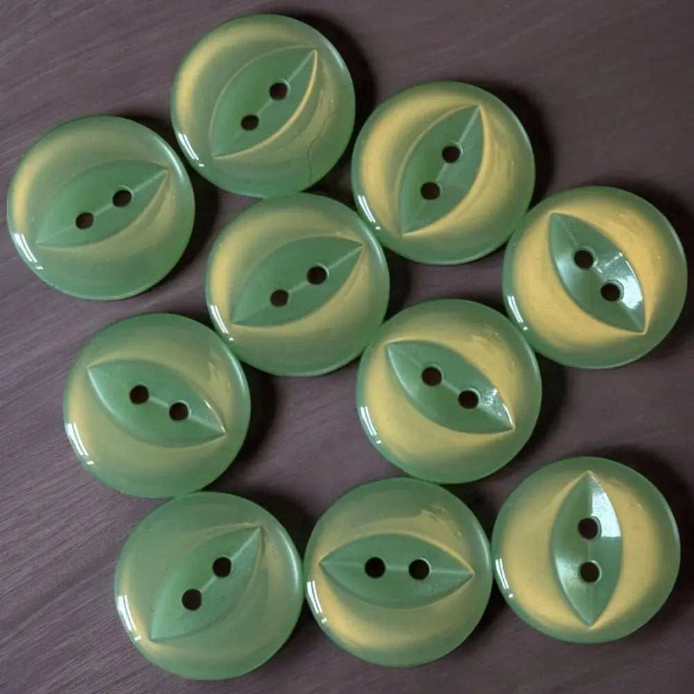 Ten green leaf-shaped buttons.