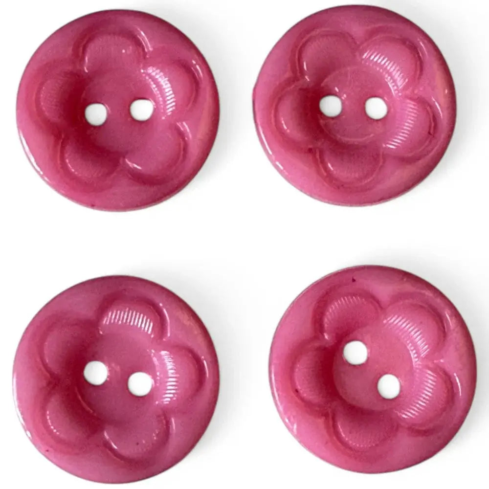Four pink flower-shaped buttons.