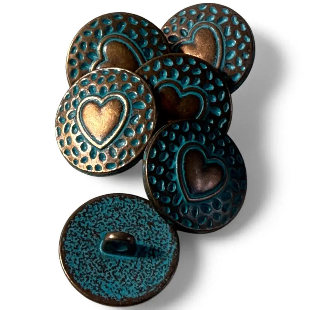 Textured teal and bronze heart buttons.