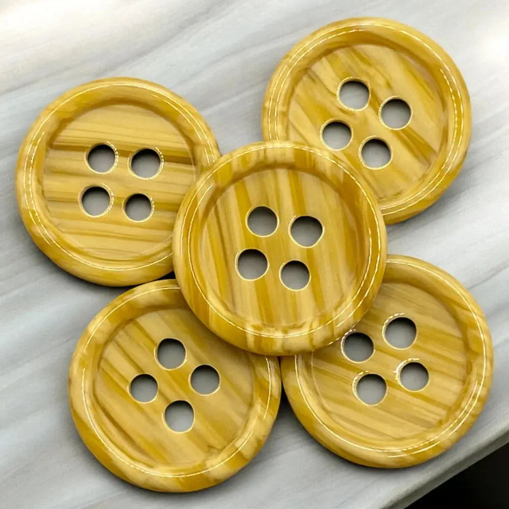 Five-holed wooden buttons.