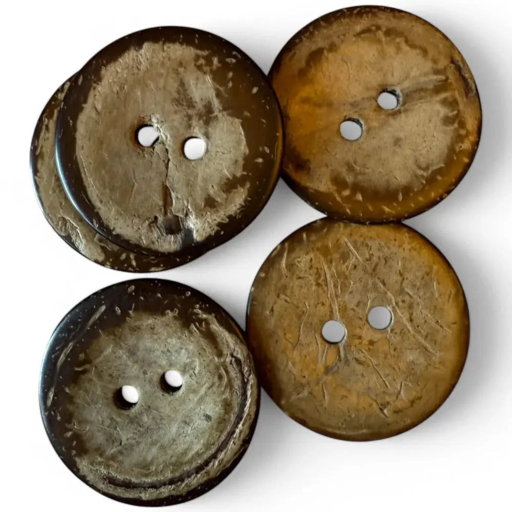 Four brown coconut buttons.
