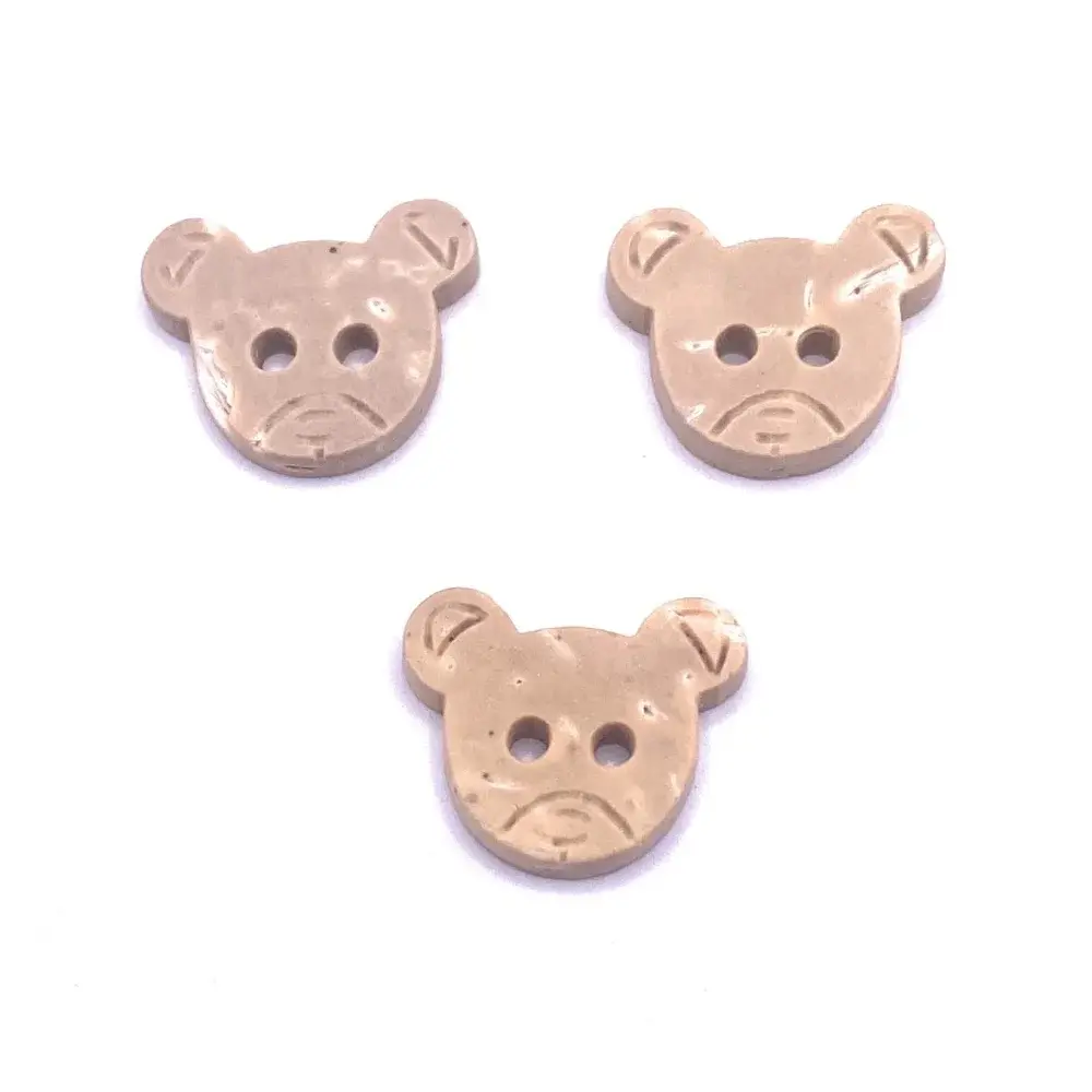 Three beige bear-shaped buttons.