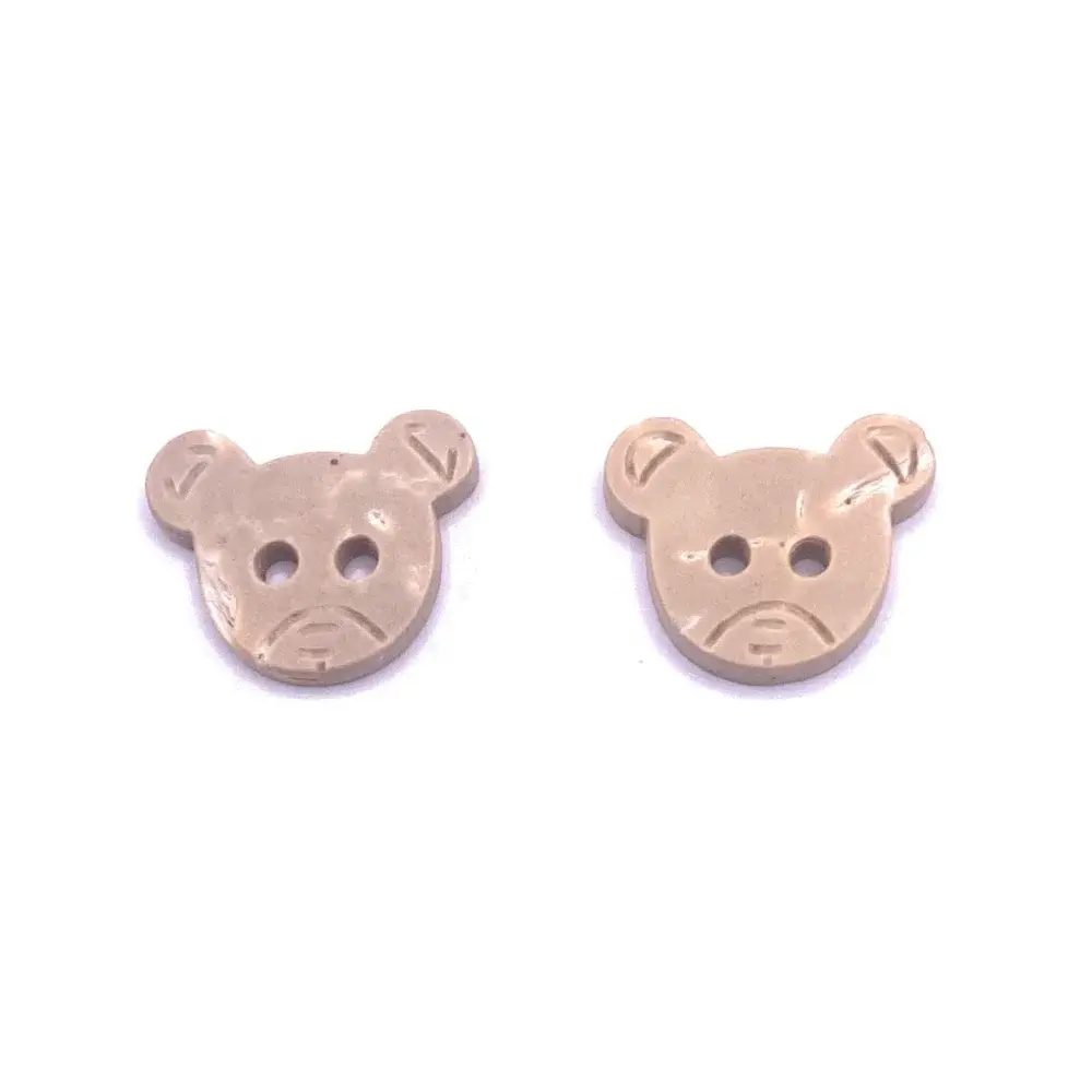 Two beige bear-shaped buttons.