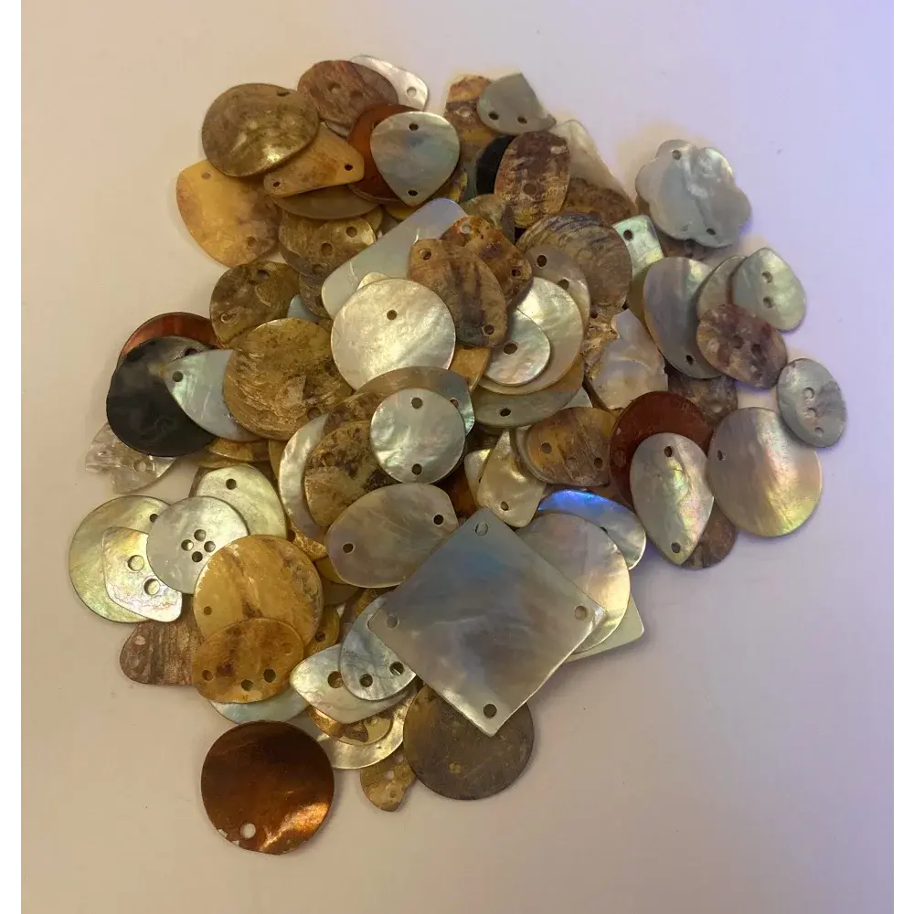 Pile of iridescent shell beads.