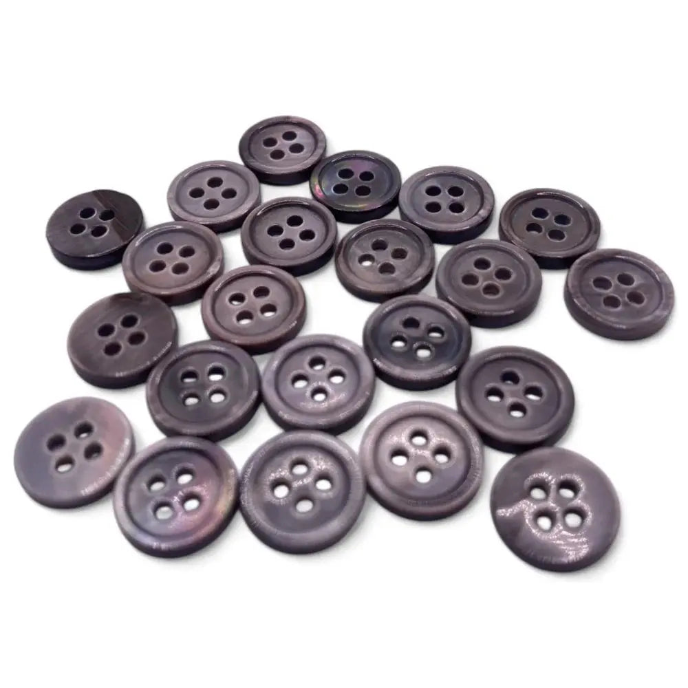 Pile of four-hole buttons.