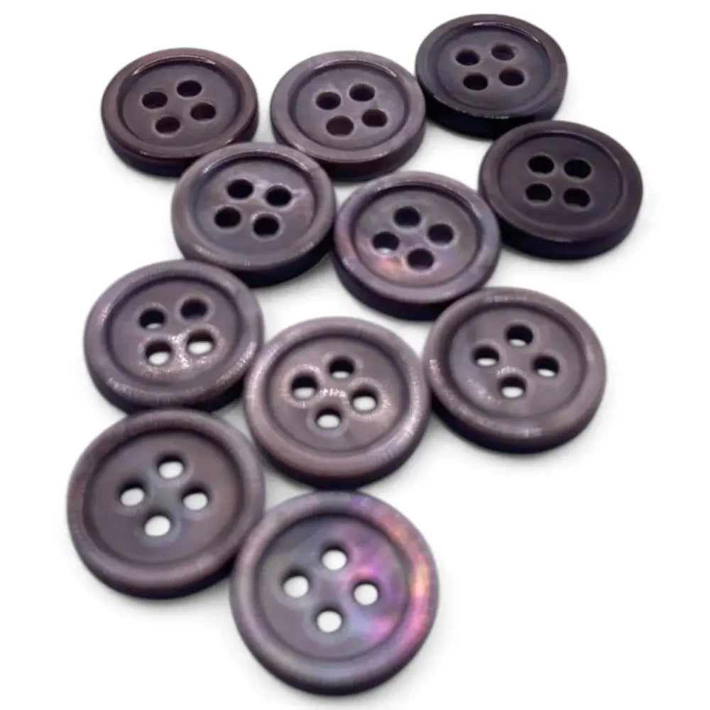 Group of iridescent four-hole buttons.
