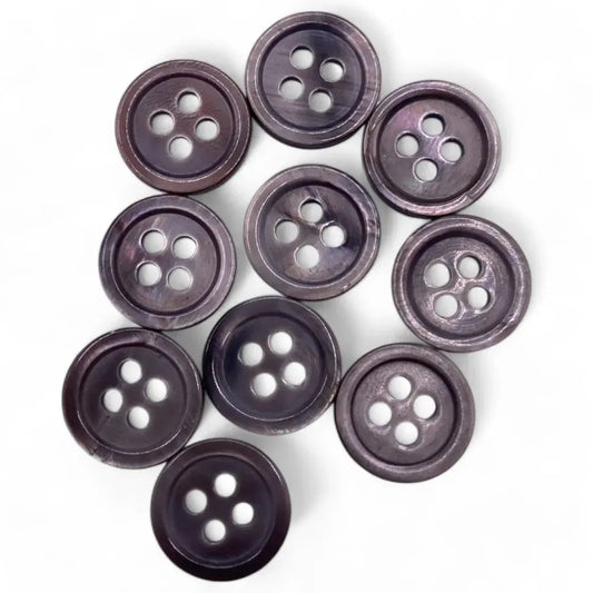 Group of dark, four-hole buttons.
