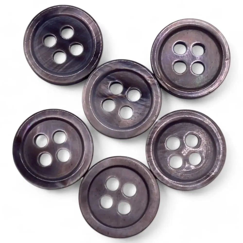 Six dark, four-hole buttons.