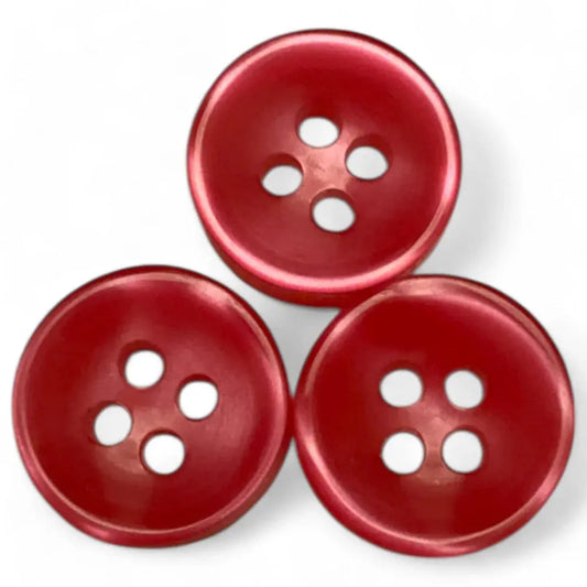 Three red four-hole buttons.