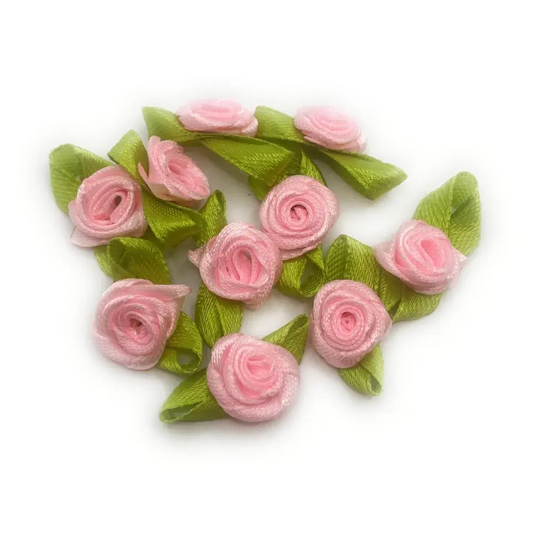 Pink ribbon rose embellishments.