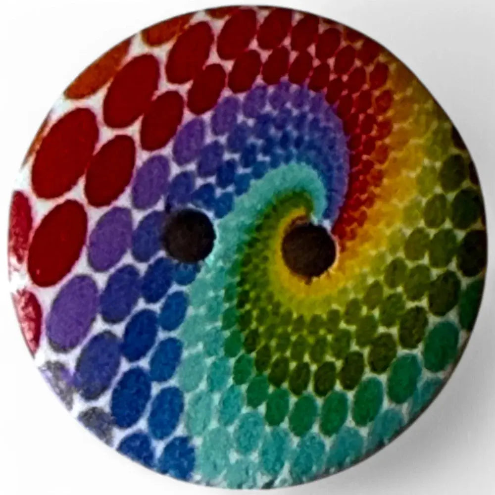 Rainbow-colored button with spiral pattern.
