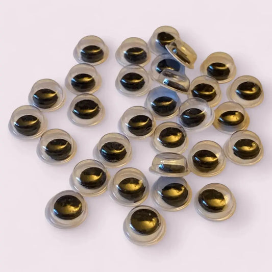 Pile of black doll eyes.