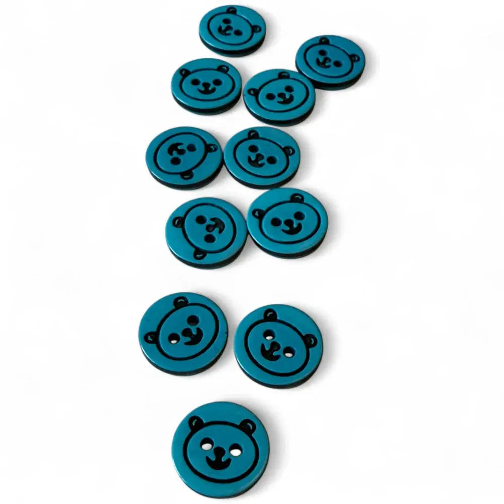 Teal bear-faced buttons.