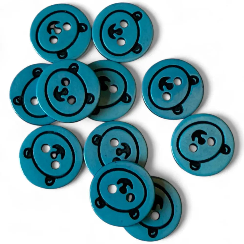 Turquoise buttons with anchor design.