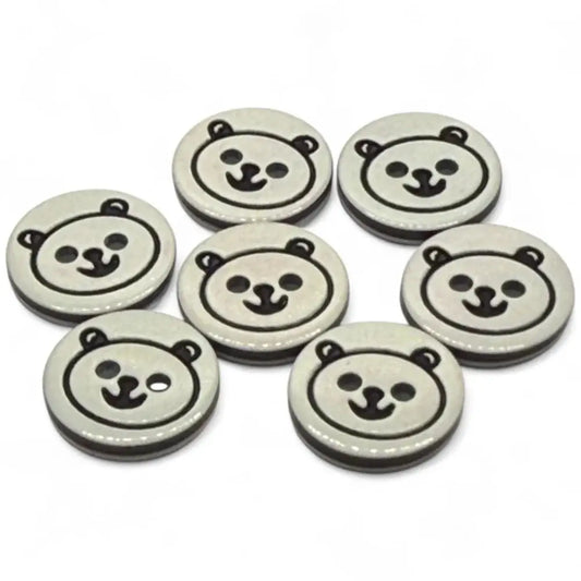 Seven bear-faced buttons.