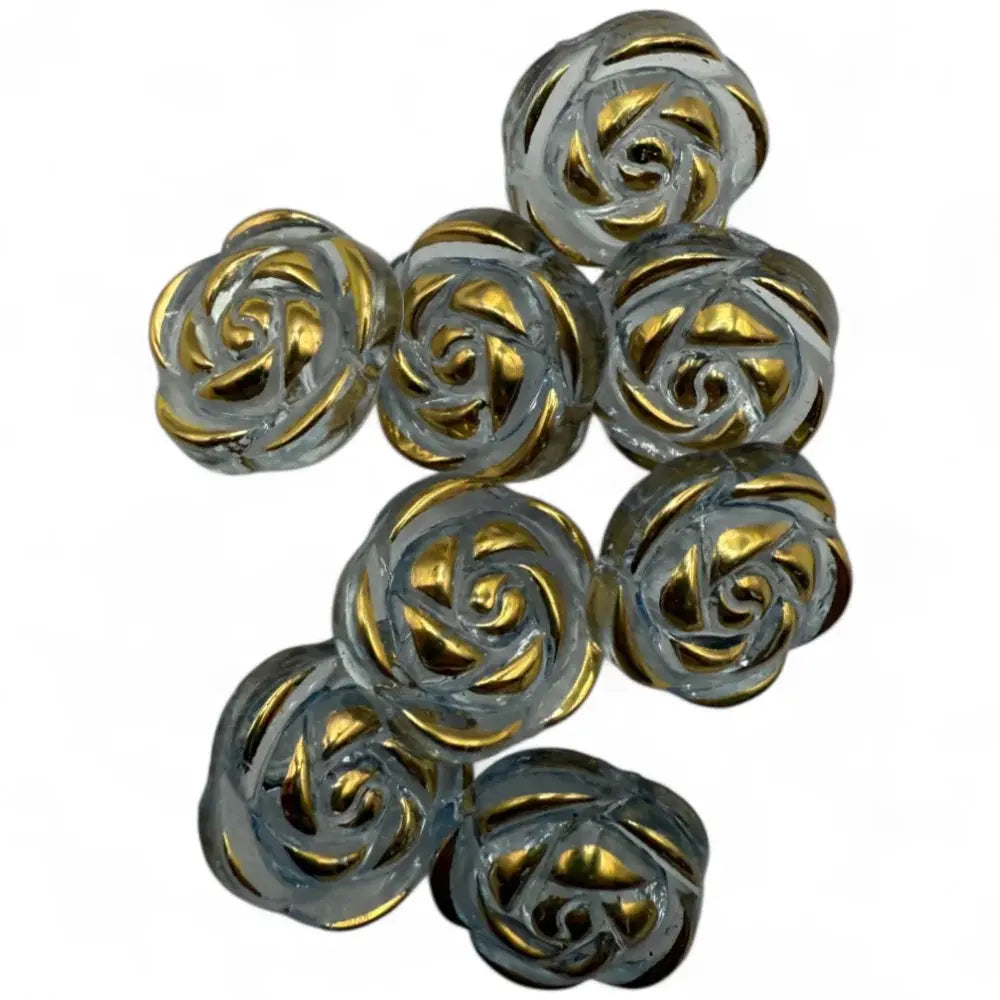 Rose-shaped glass buttons with gold accents.