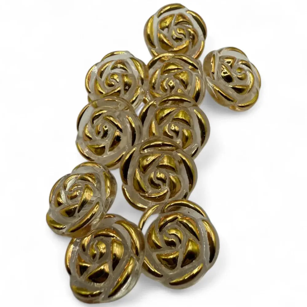 Golden rose-shaped buttons.
