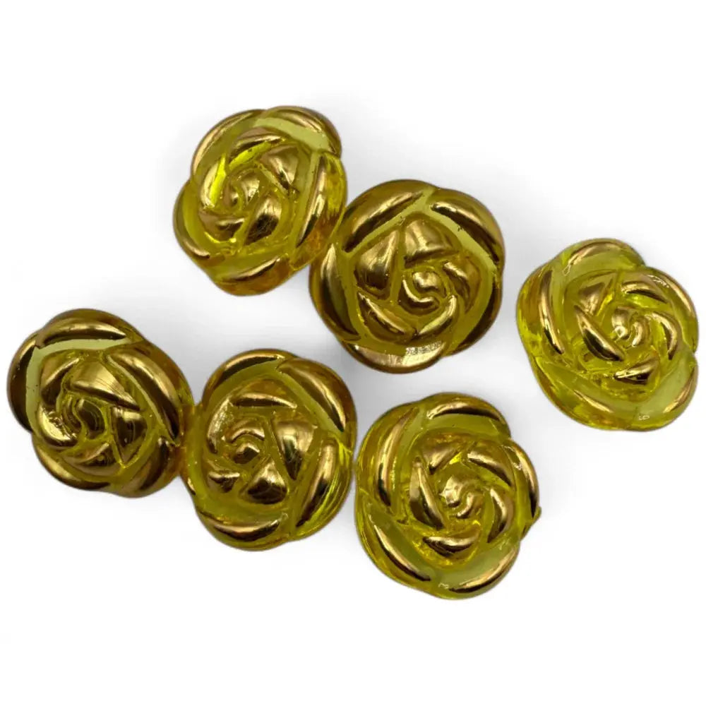 Translucent yellow rose-shaped buttons.