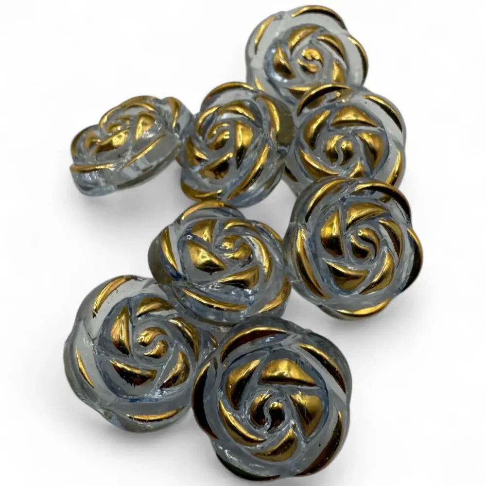 Gray glass rose buttons with gold accents.