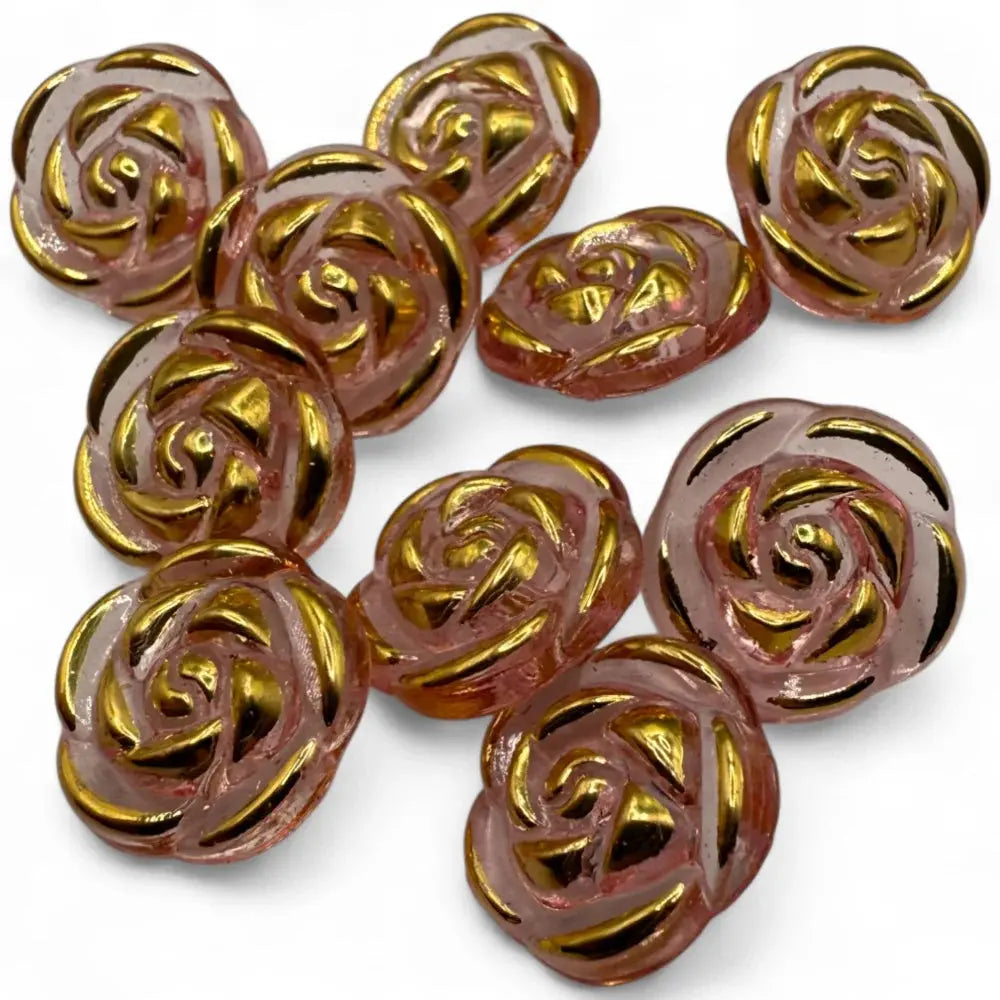 Rose-shaped pink and gold glass beads.