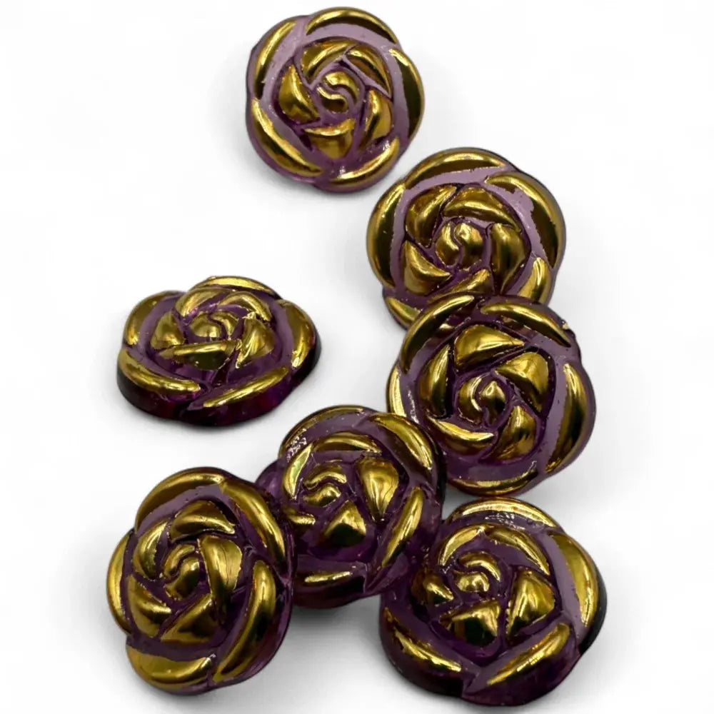 Purple and gold rose-shaped buttons.