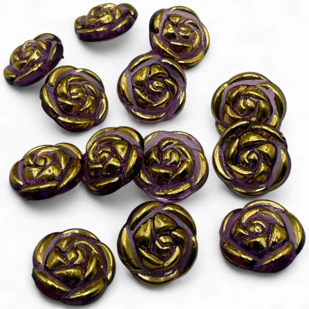 Purple and gold rose-shaped buttons.