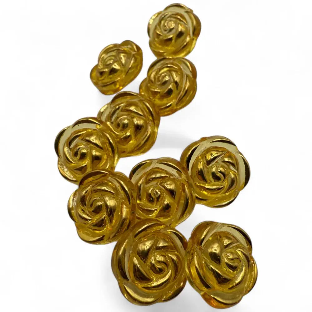 Golden rose-shaped buttons.