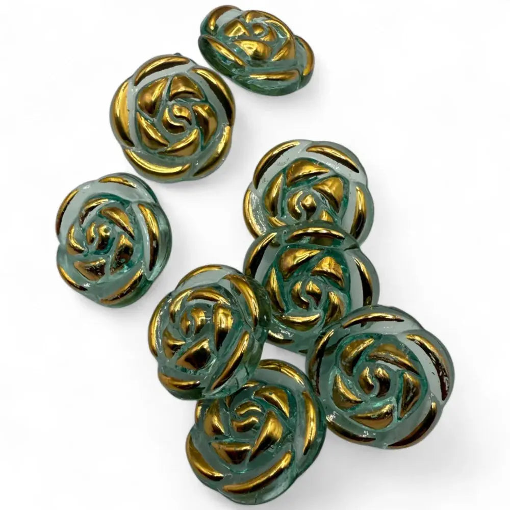 Green and gold rose-shaped buttons.