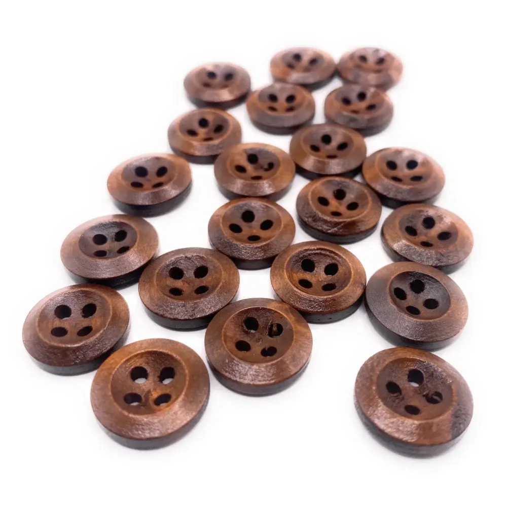 Pile of brown wooden four-hole buttons.