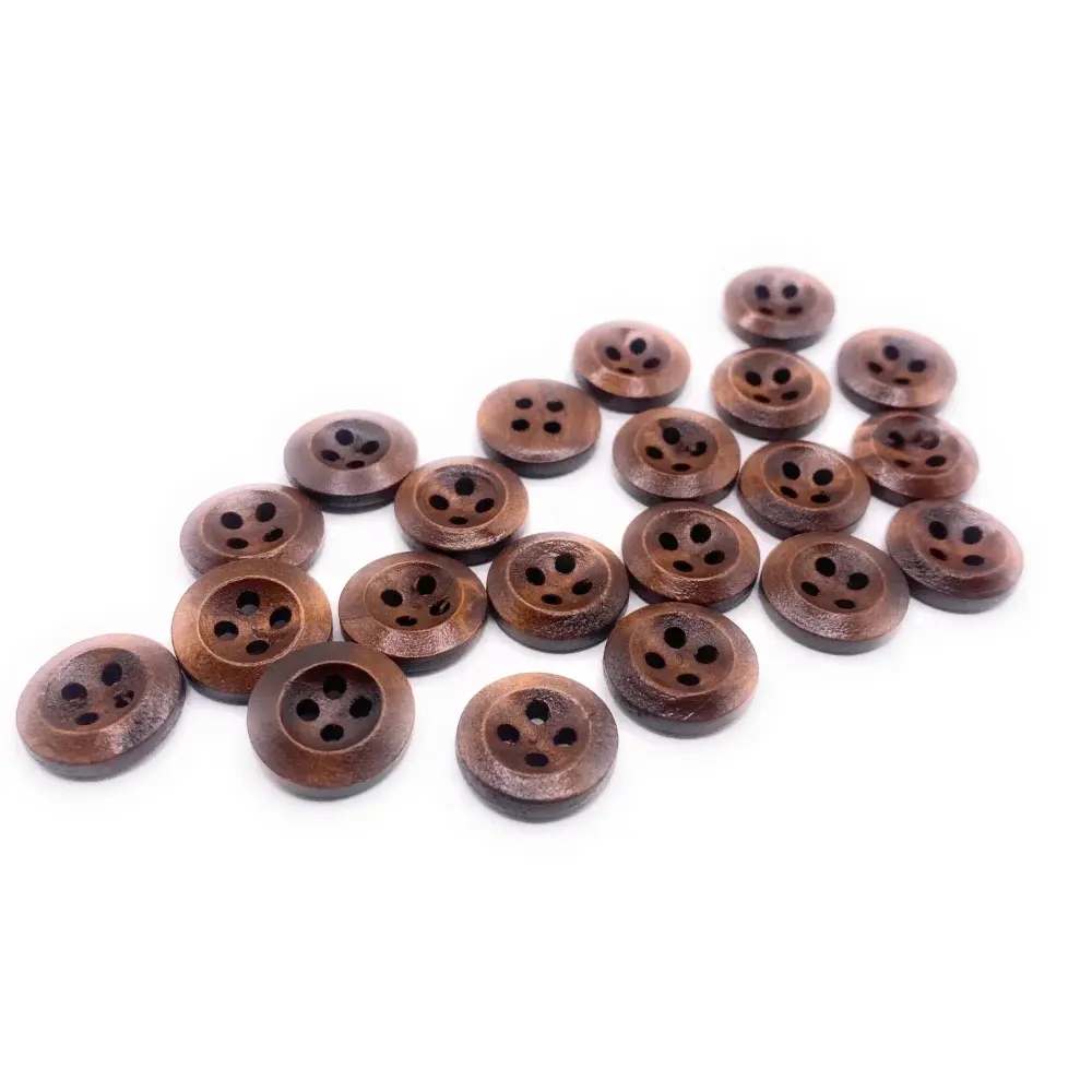 Pile of brown four-hole buttons.