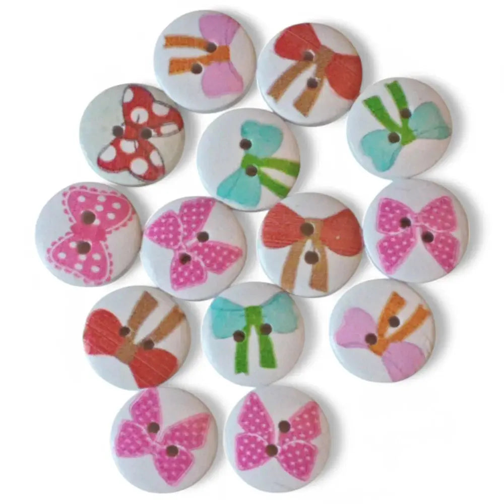 Round wooden buttons with bow designs.