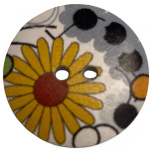 Floral patterned button with two holes.