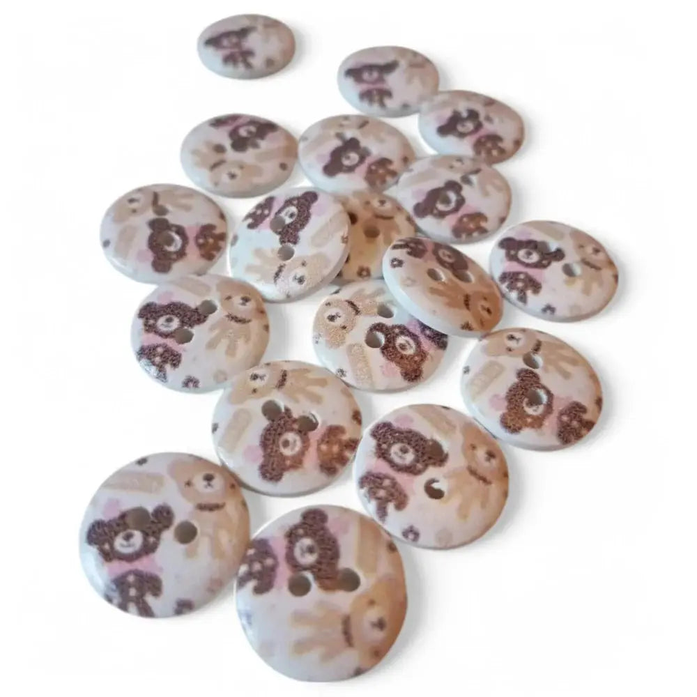 Round buttons with teddy bear designs.
