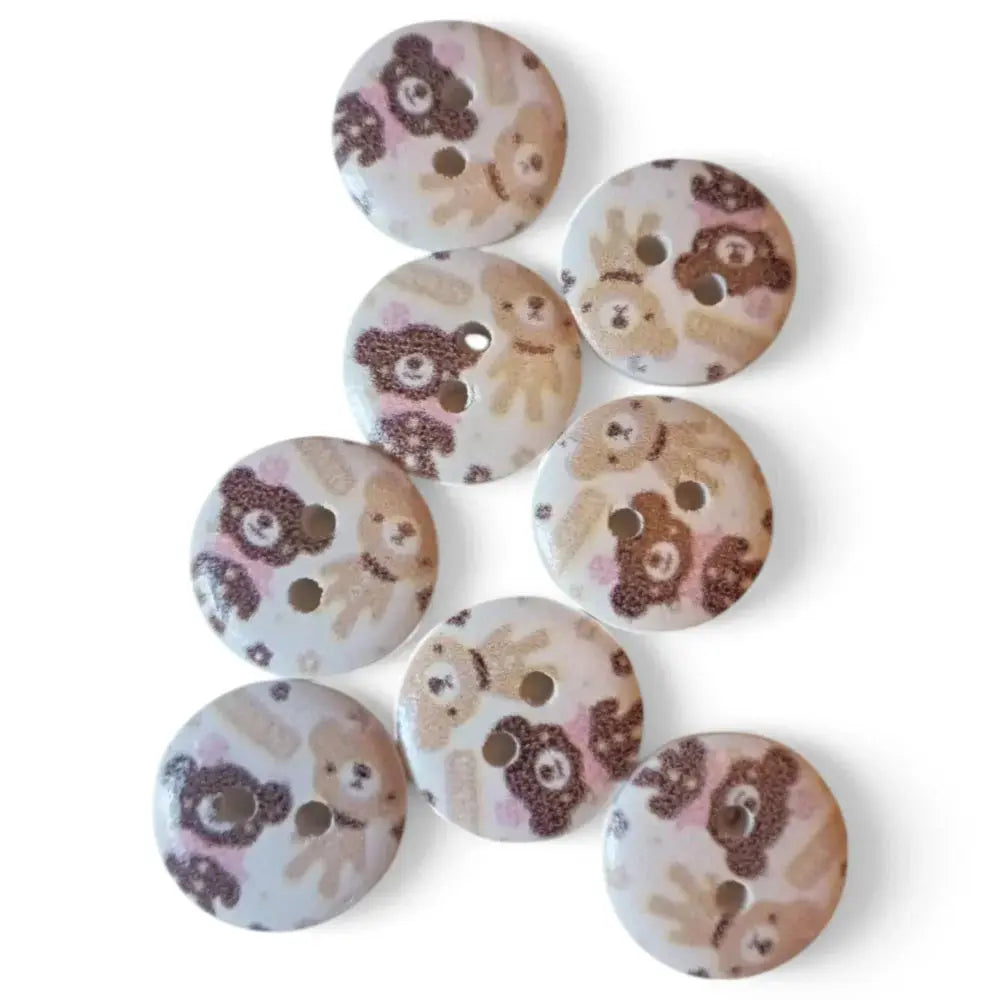 Round, teddy bear patterned buttons.