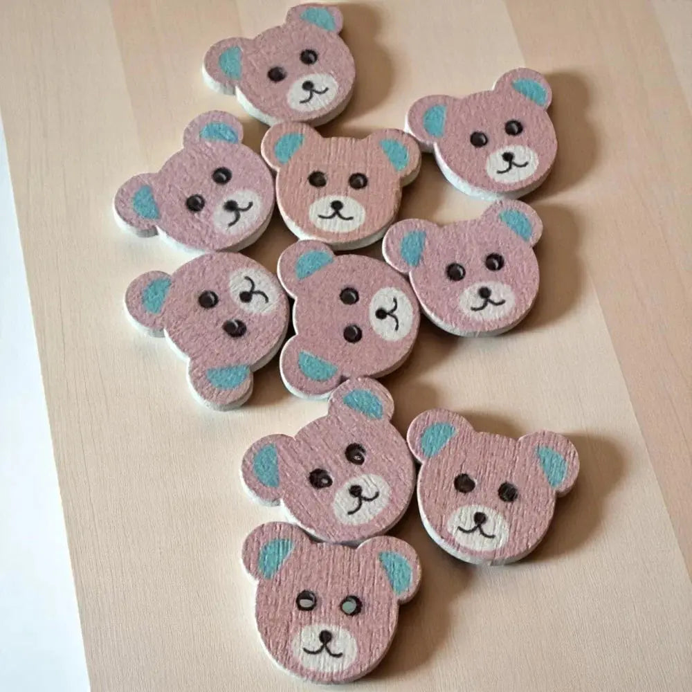 Pink wooden teddy bear buttons.