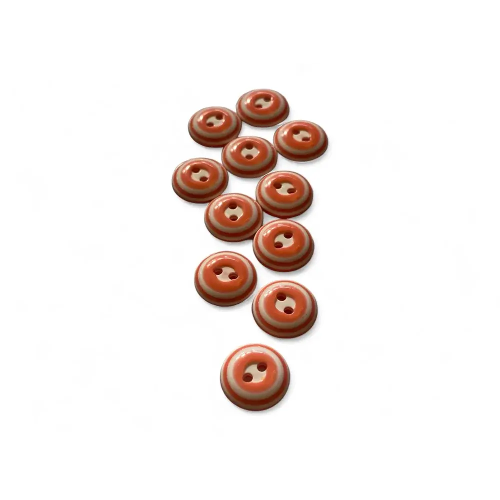 Striped orange and white buttons.