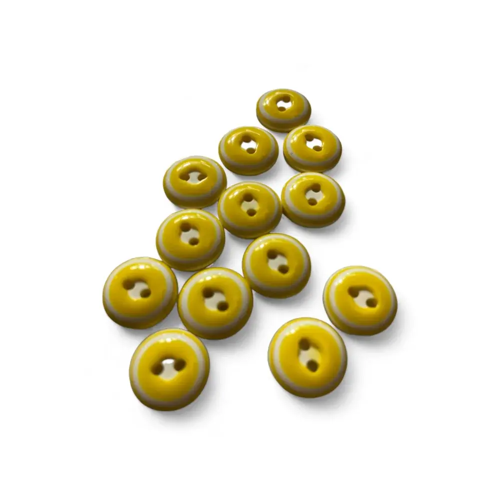 Yellow and white two-hole buttons.