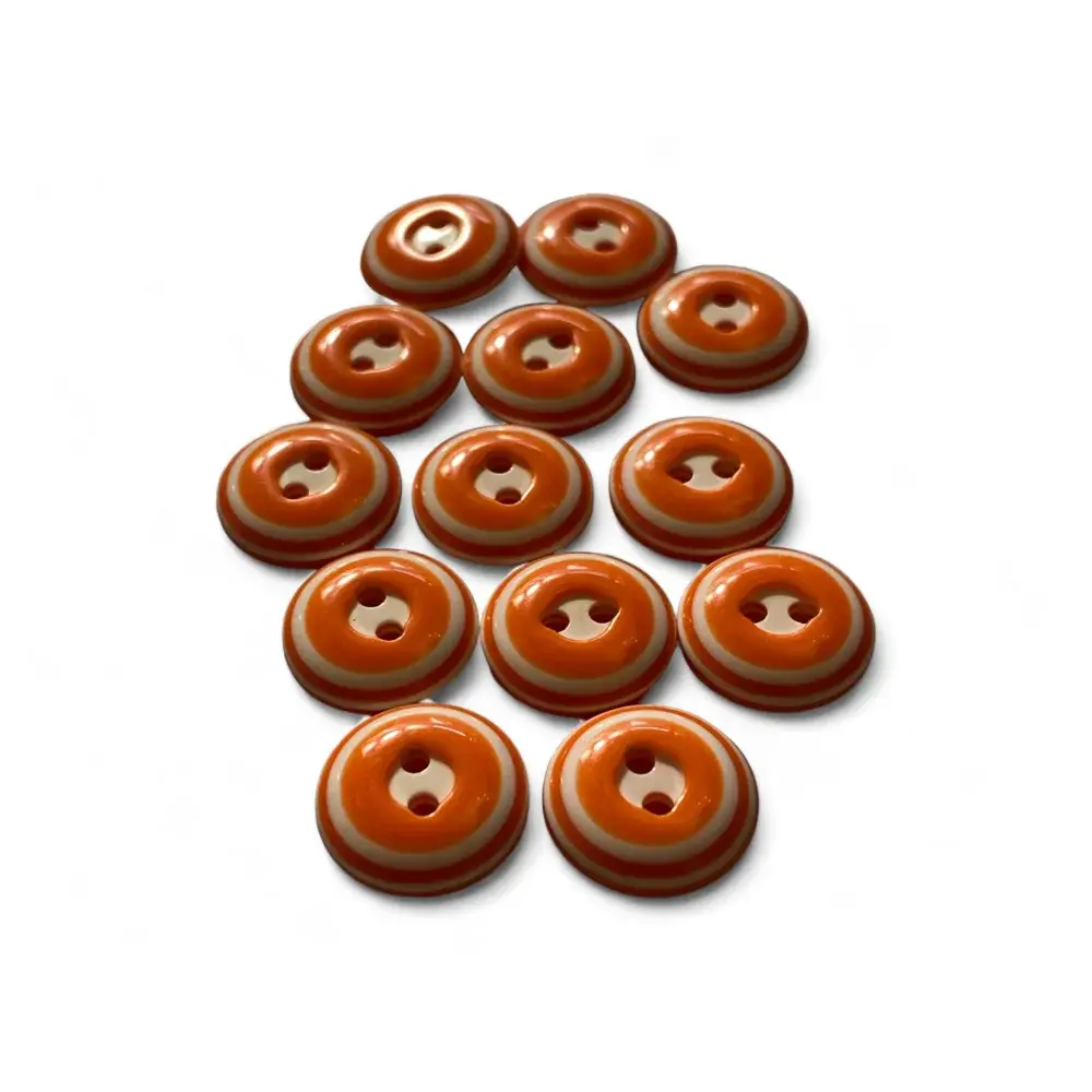 Orange and white striped buttons.