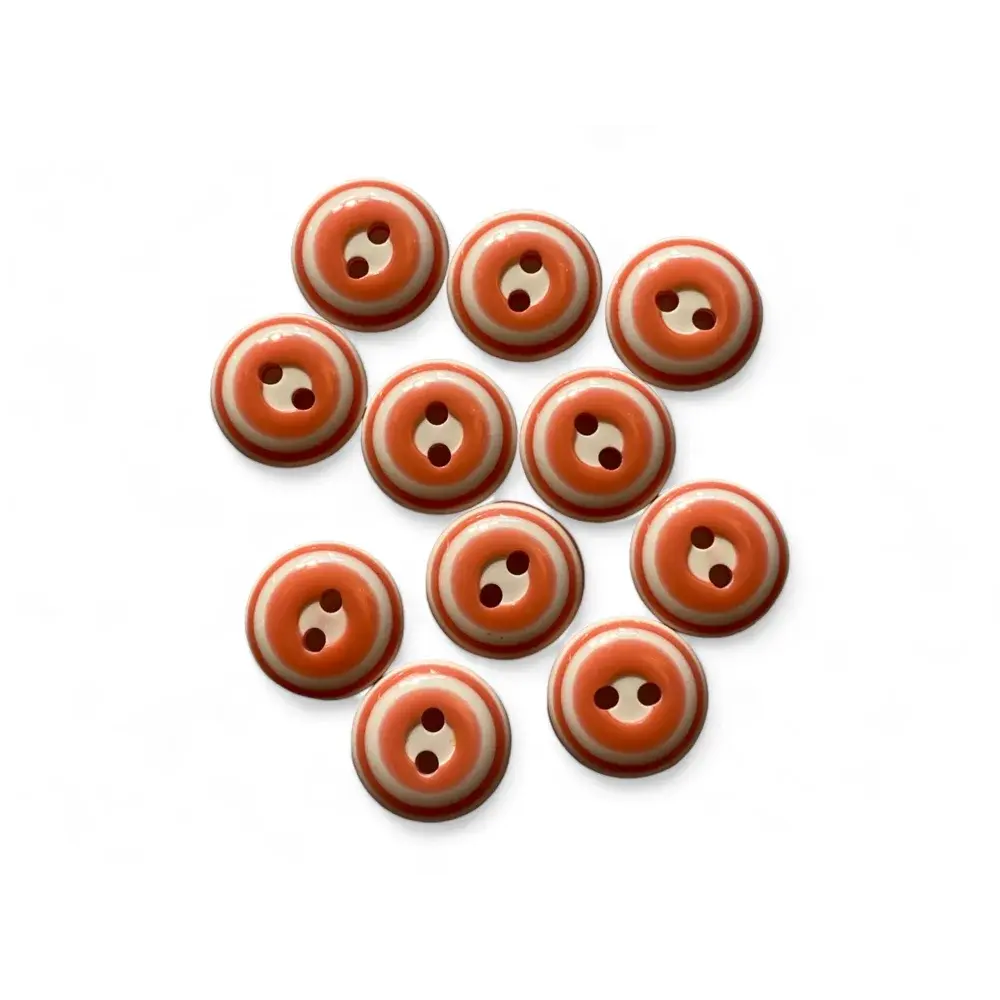 Group of two-hole striped buttons.