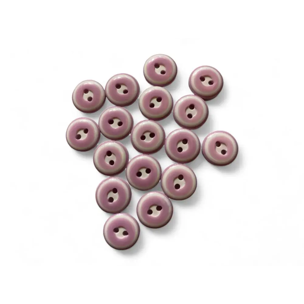 Collection of mauve two-hole buttons.