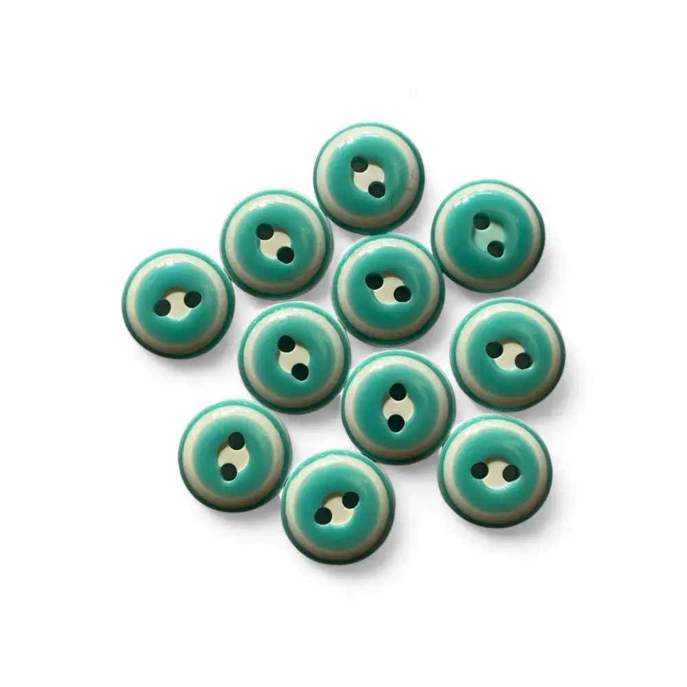 Turquoise and cream two-hole buttons.