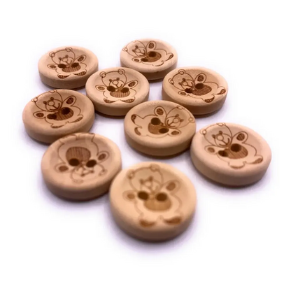 Wooden buttons with teddy bear designs.