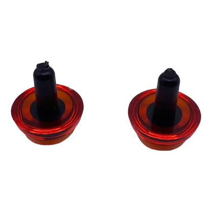 Two red and black doll eyes.