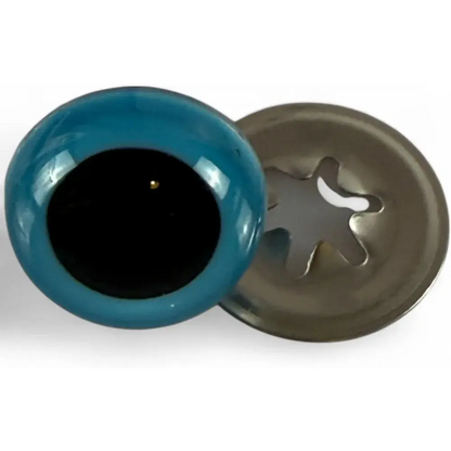 Blue toy eye with metal washer.
