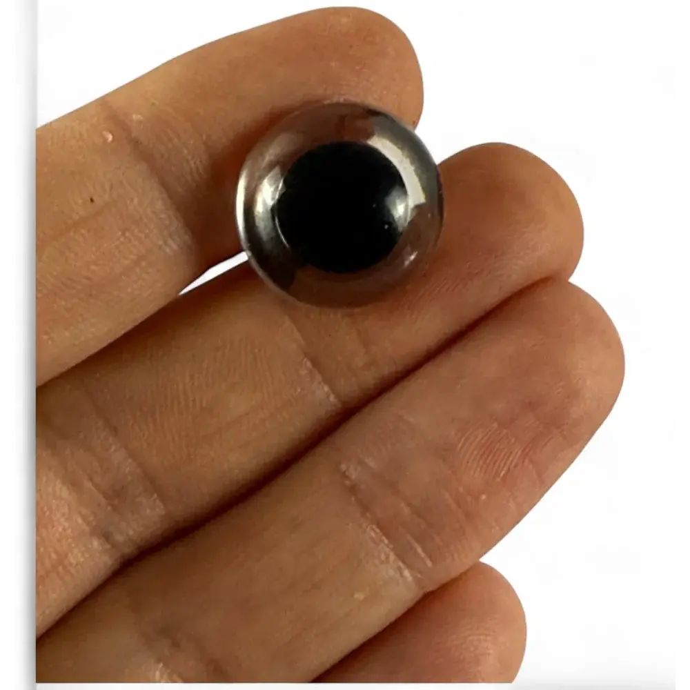 Black glass eye.