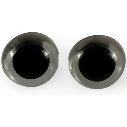 Pair of black doll eyes.