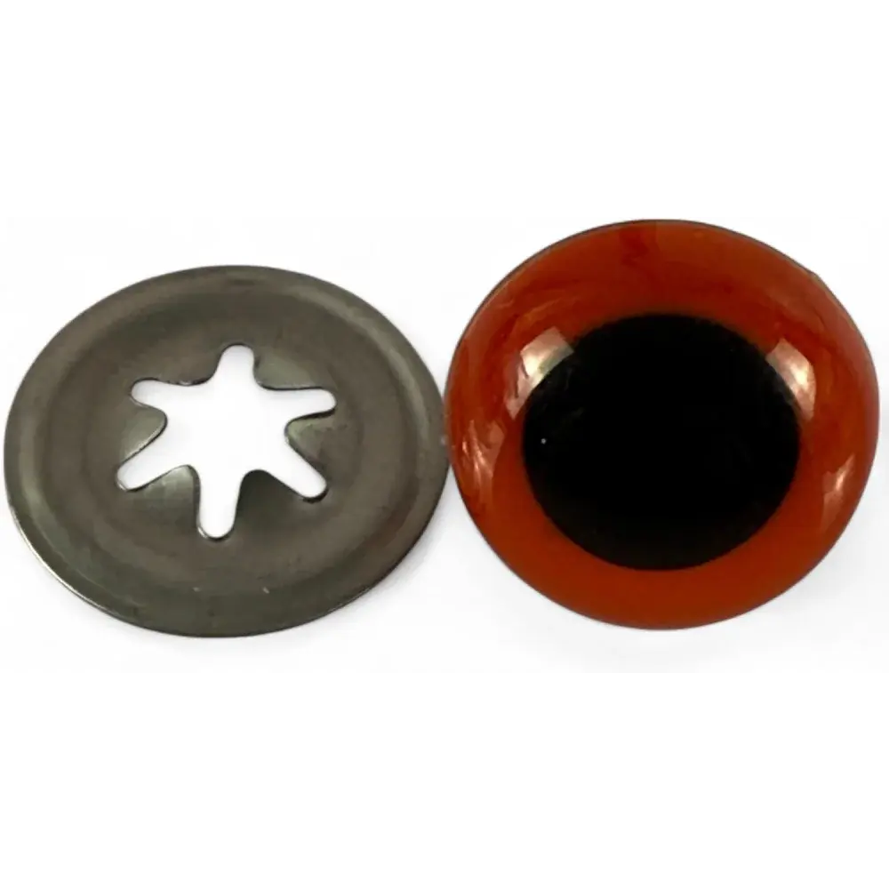 Brown and black toy eye with metal washer.