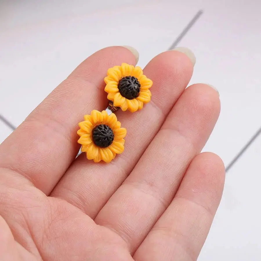 Sunflower-shaped earrings.